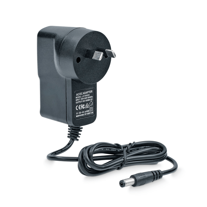 The 5V USB Adaptor Plug for Deluxe Electric Dog Fence from Pet Control HQ is a black AC/DC power adapter with a two-prong plug and an extended black cable, featuring specifications written in white. This USB charger is neatly coiled, suggesting it’s tailored for regions with compatible outlets.