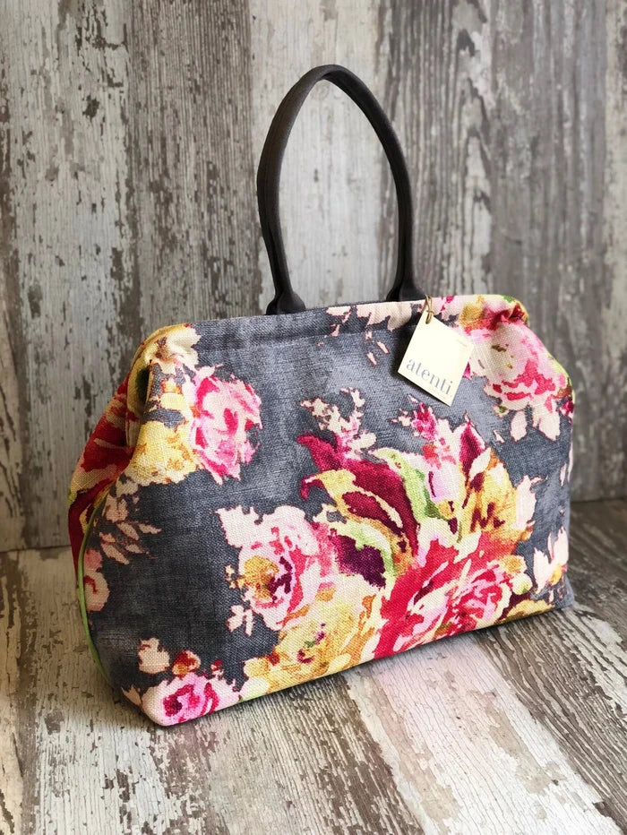 Atenti Blossom Grey Pioneer handbag with oversized floral print, dark double handles, and green side piping