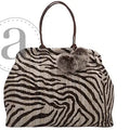 Atenti Born Free Chocolate Pioneer handbag with zebra-inspired woven pattern, dark brown double handles, and dimensional floral embellishment