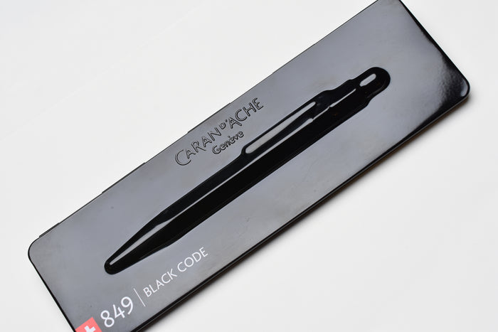 Caran d'Ache 849 Metal Ballpoint Pen - Black Code With Metal Slim Pack Case