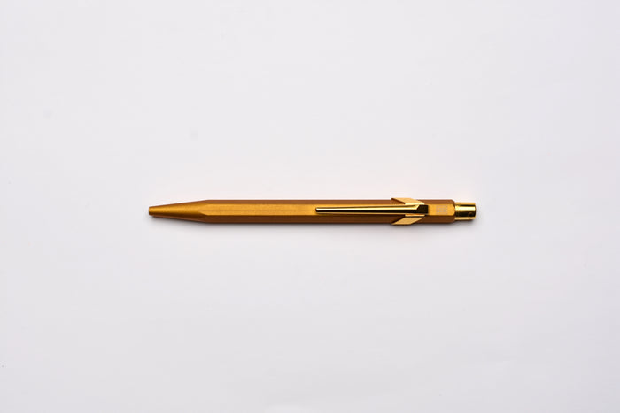 Caran d'Ache 849 Metal Ballpoint Pen - Goldbar With Metal Slim Pack Case