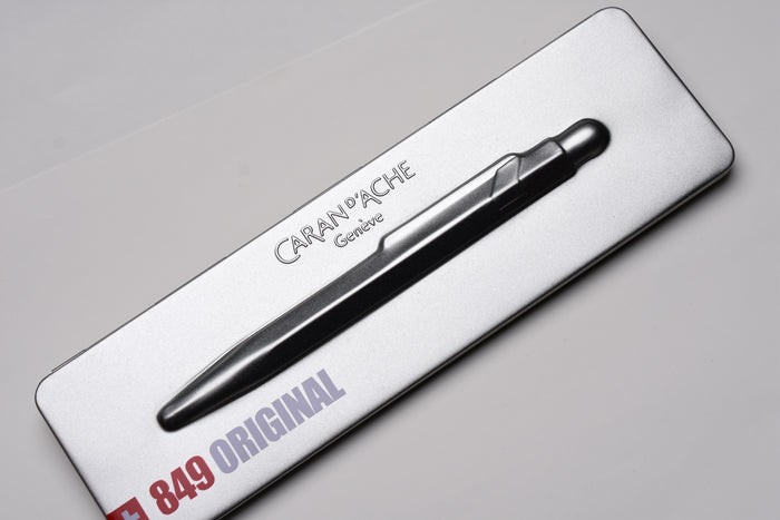 Caran d'Ache 849 Metal Ballpoint Pen - Original With Metal Slim Pack Case