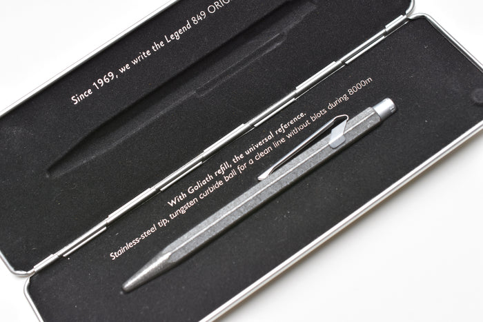 Caran d'Ache 849 Metal Ballpoint Pen - Original With Metal Slim Pack Case