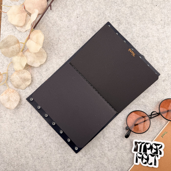 Imperfect Concepts Juniper Leather Notebook - A6  Trifold - Black w/ Gold Grommets